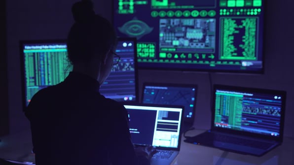 cybersecurity professional on computer